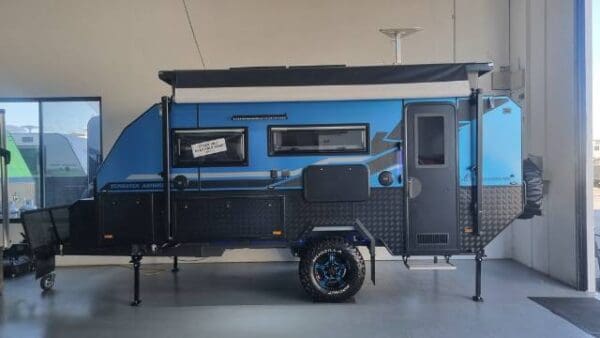  Front and Rear<br>- Fibreglass One Piece Roof<br>- 2.7T Off Road Suspension<br>- Extended 6 RHS Box Steel A-frame and Steel Truss Chassis<br>- Recessed DO35 Off-Road Hitch<br>- 16 Off Road Tyres and Colour Matched Alloy Wheels<br>- External Hot and Cold Shower<br>- A-frame Tap<br>- Generator Slide Toolbox<br>- Stone Guard<br>- 600mm Heavy Duty Checker Plate Sides<br>- 2 x 65L Water Tanks<br>- 1 x 65L Grey Water Tank<br>- 1 x 43L dedicated drinking water tank<br>- External Shower<br>- A-Frame Tap<br>- Water Filter and Tap at sink<br>The ultimate Off Road Caravan