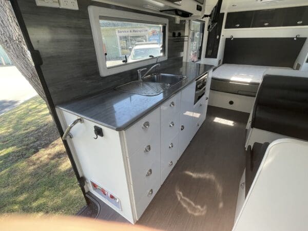 990!<br><br>Great quality van with all the comforts built in.Island walk around bed 