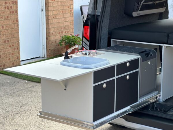  with fridge/ freezer and built in cooker<br /><br />Fold away bed which allows the right side of the van to accept bikes