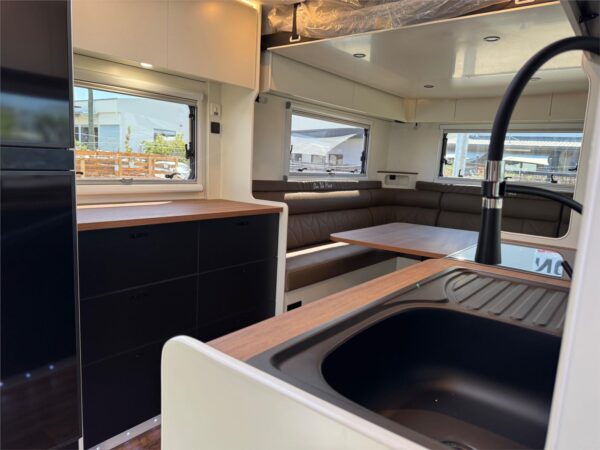  aluminium framed<br />Electric drop down bed (1500x1900)<br />Soft Close Drawers & Metal Runners <br />Splashback <br />Door Side Pocket & Coat Hooks <br />Door Head Protection <br />Leatherette Upholstery <br />Queen Memory Foam Mattress  <br />Dometic Freshjet 7 Series A/C <br />Dometic 188L Compressor Fridge <br />Multifunction Convection Microwave 34L <br />Dometic Stove (Gas/Electric) <br />Wall Mounted Washing Machine <br />Water Heater (Instant) <br />Cassette Toilet <br />Range Hood <br />Reverse Camera <br />24” Flat Screen TV <br />Stereo with Internal/External Speakers <br /><br /><br />If this van suits your needs then pop in a chat to the sales team today!