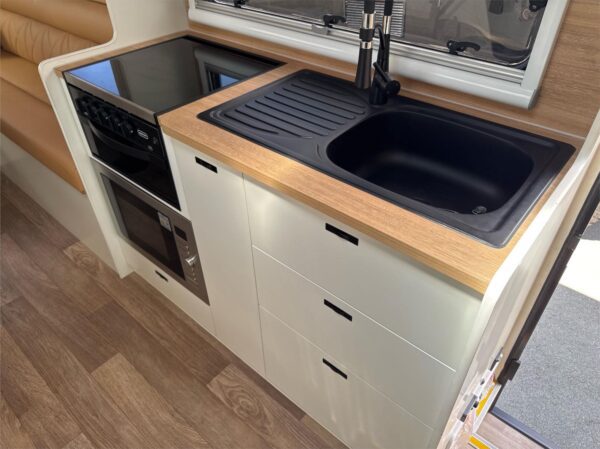 990<br /><br />Step up to serious off-road touring with this On The Move Grenade 6.3 Black Edition – a premium dual axle caravan built for strength